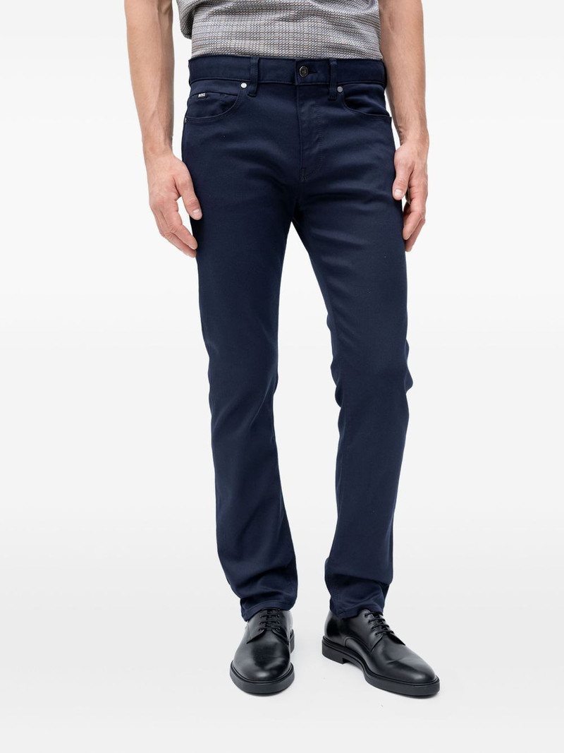 Delaware logo-patch jeans 1