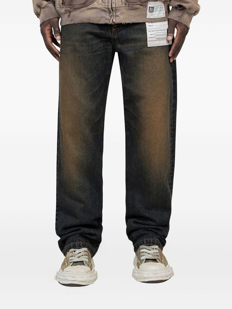 zip-fastening faded jeans 1