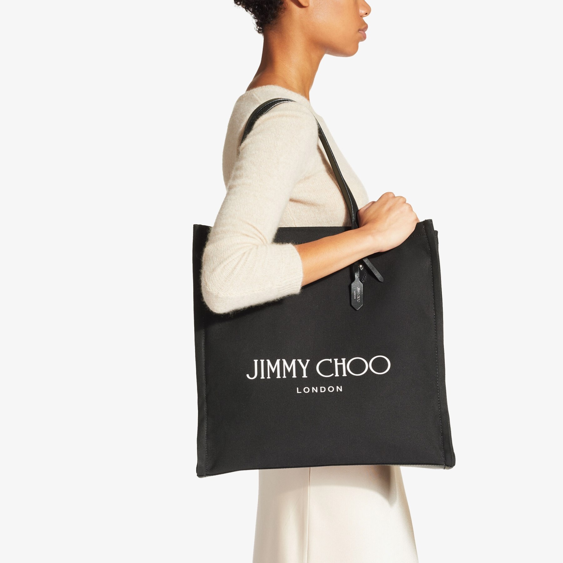 Logo Tote
Black Canvas Tote Bag with Black Leather Handles - 2