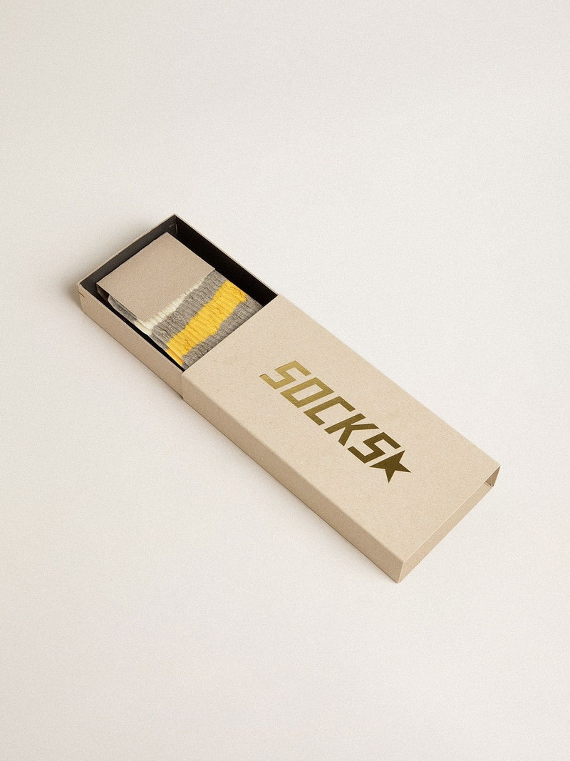 Golden Goose Gray socks with distressed details and yellow and white stripes outlook