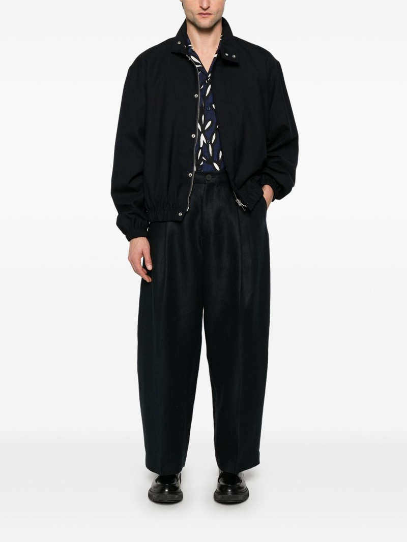 Studio Nicholson pleated trousers outlook