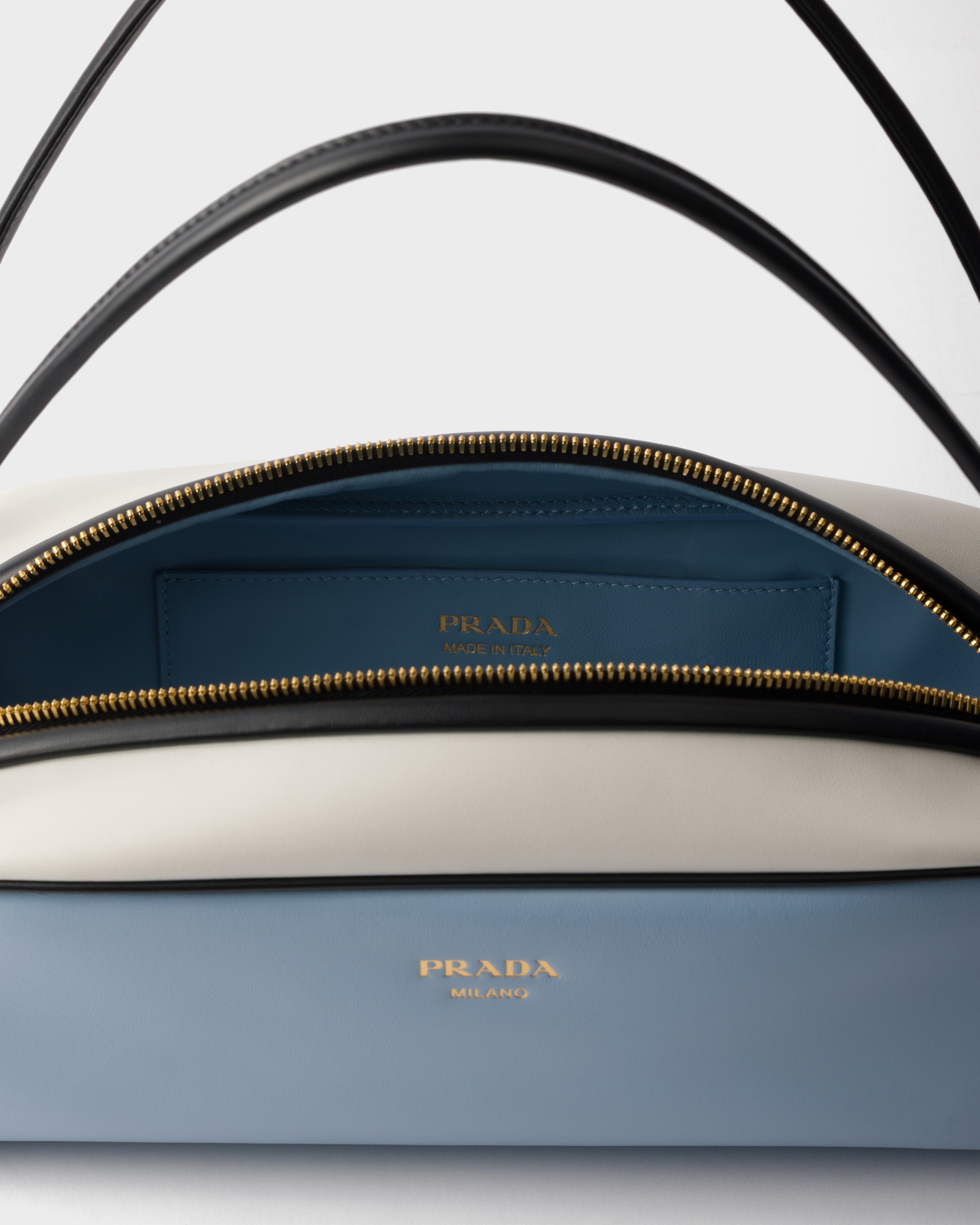 Prada Prada Swing smooth leather shoulder bag | REVERSIBLE