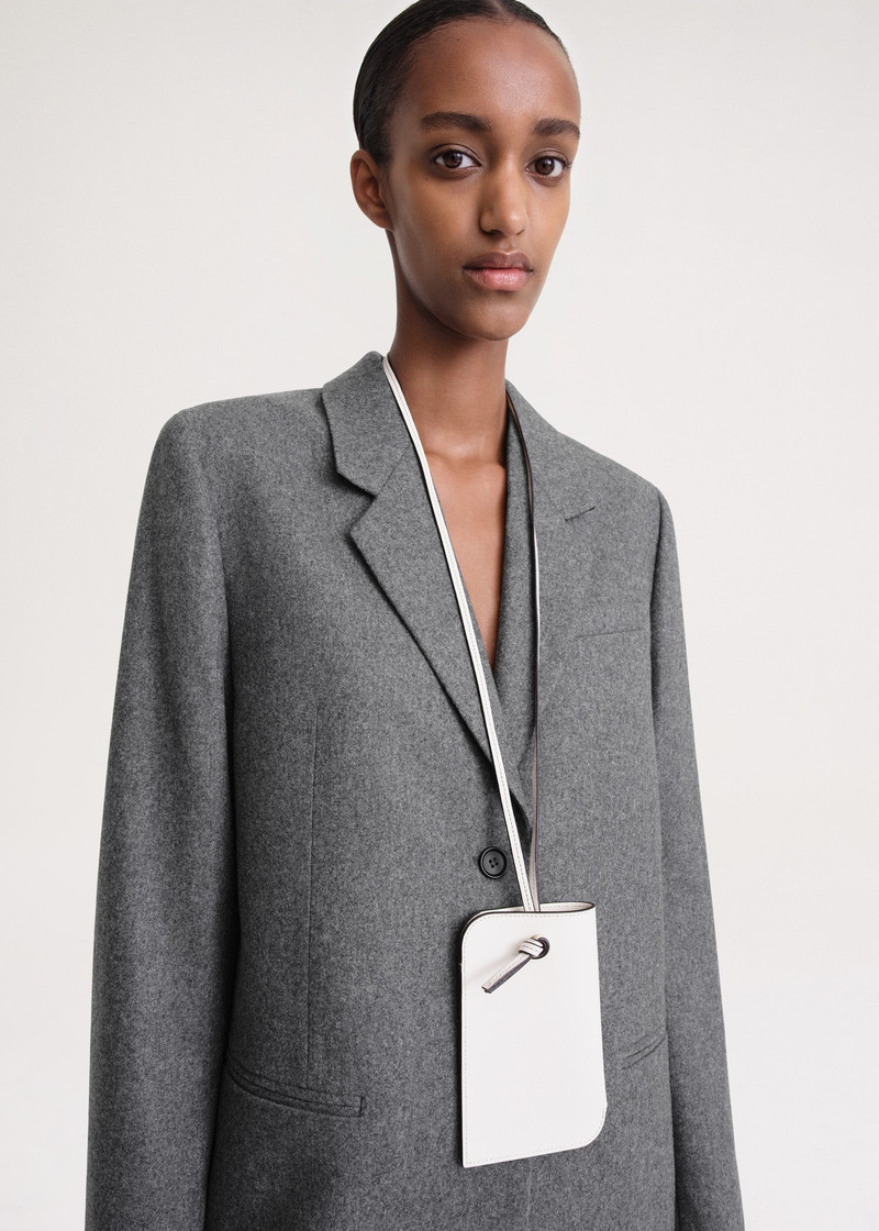 Totême Pocket leather pouch milk outlook