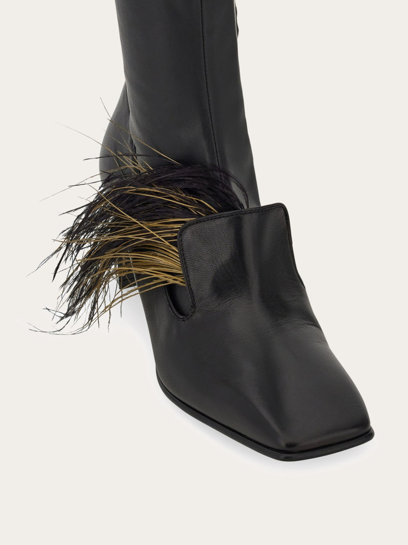 Knee high boot with detachable feathers 6
