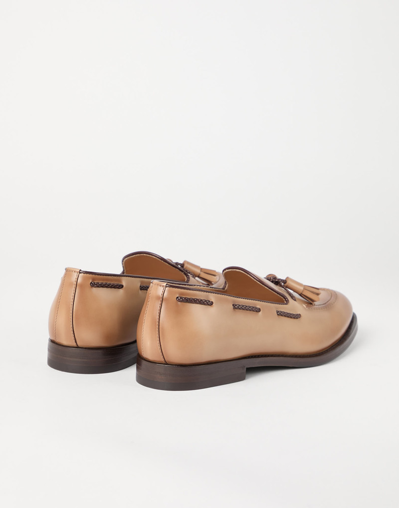 Brunello Cucinelli Polished calfskin penny loafers with tassels outlook