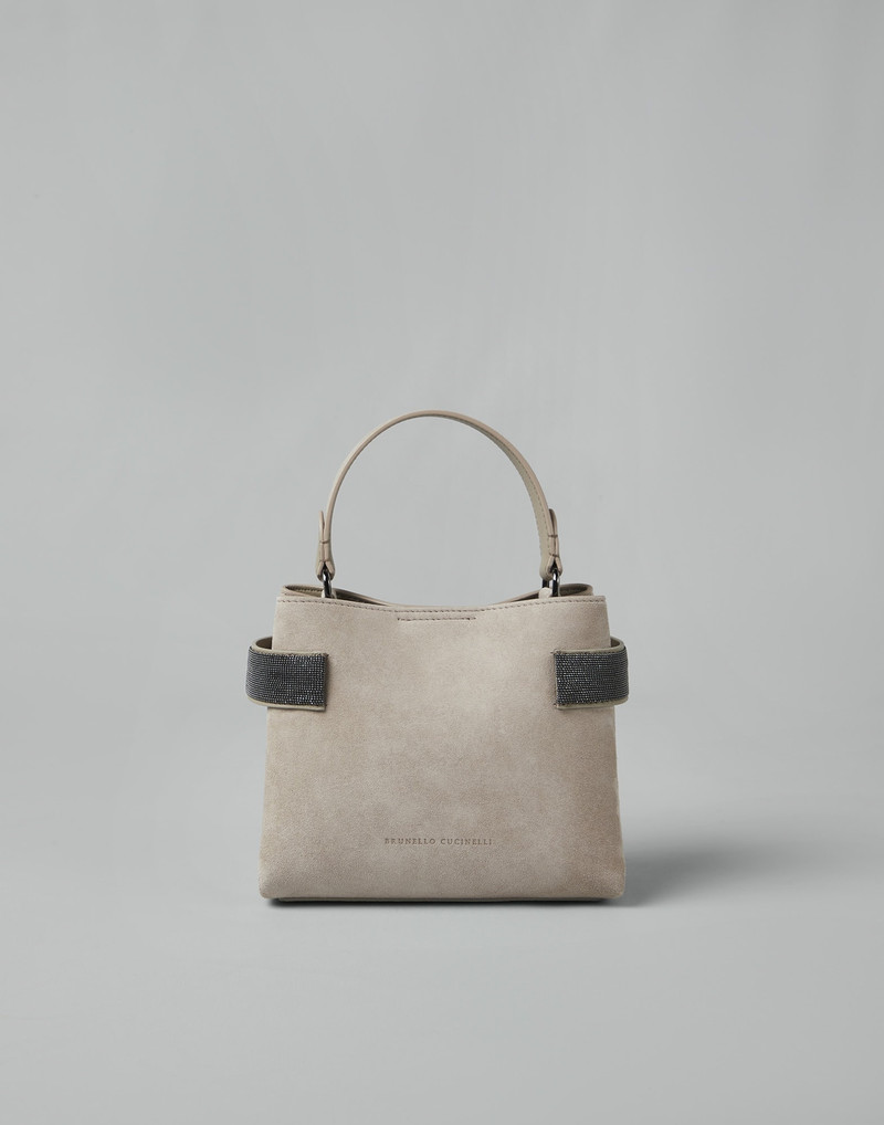 Suede bag with precious bands 1