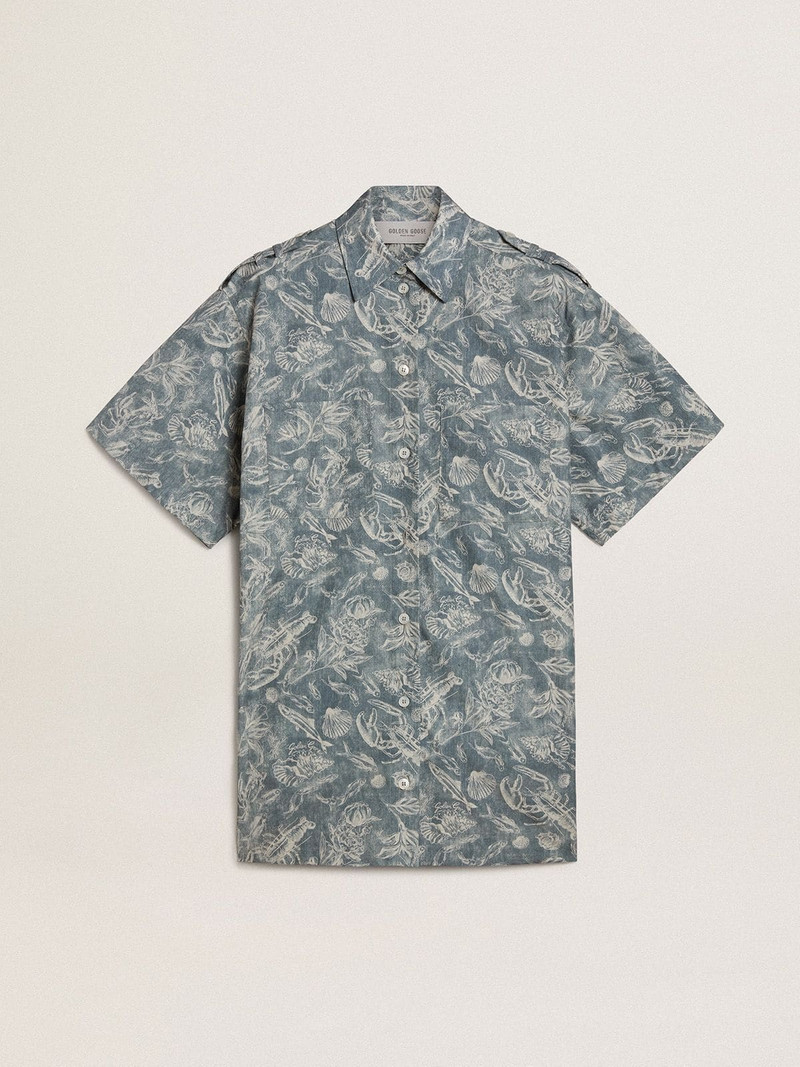 Women's short shirt dress in light blue cotton poplin with all-over marine print 1
