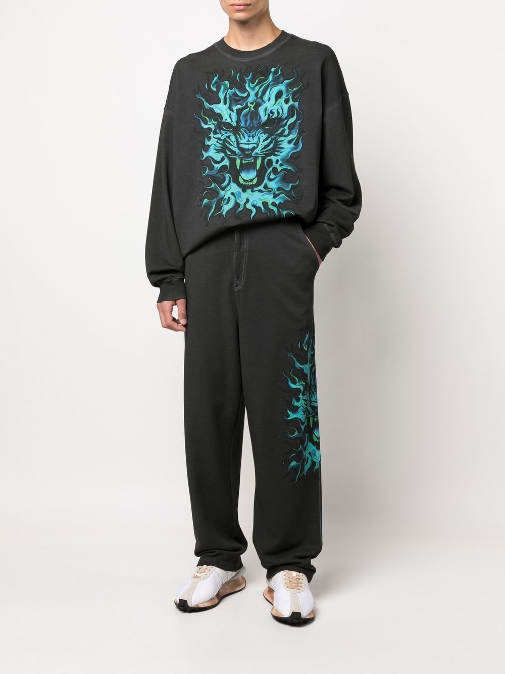 graphic-print straight trousers - 2