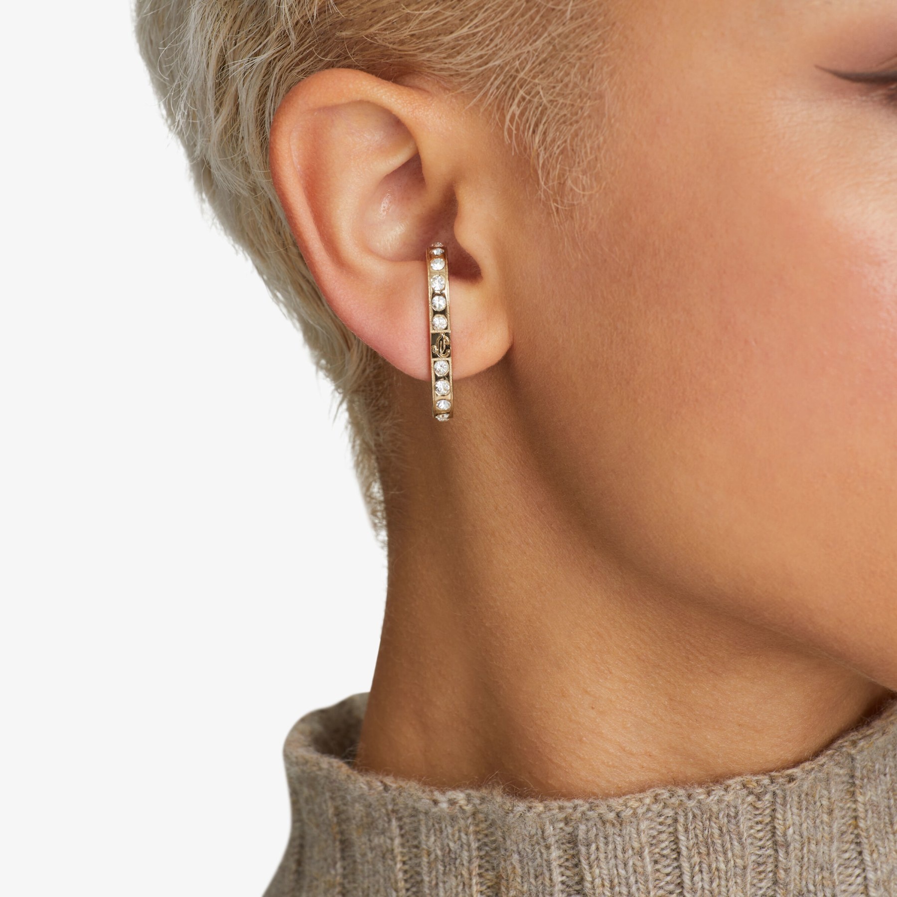 JC Cuff Earring
Gold-finish Metal and Crystal Cuff Earrings with JC Monogram - 2