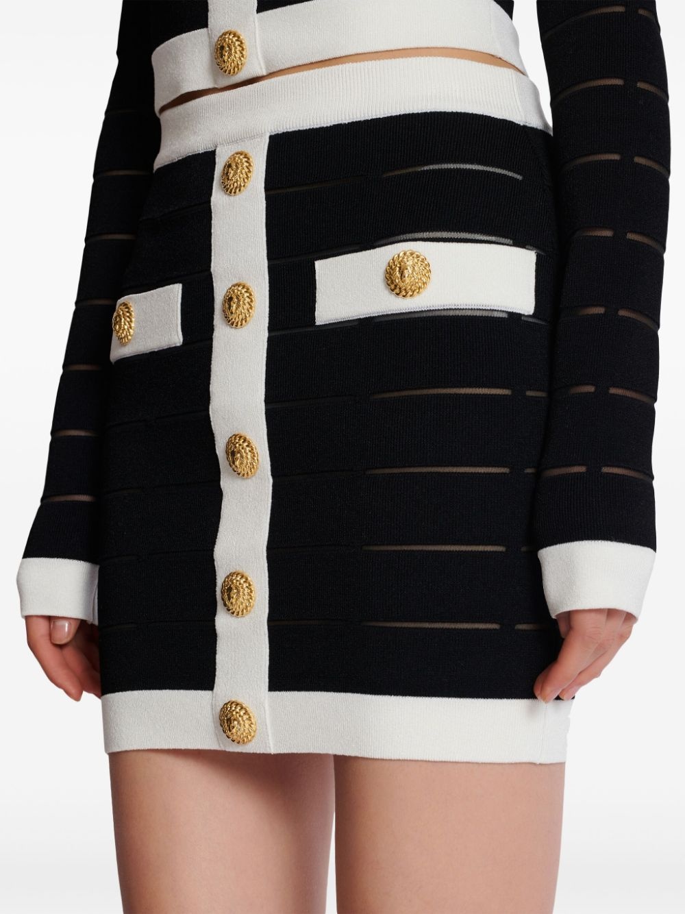 button-embellishment knitted mini skirt - 7