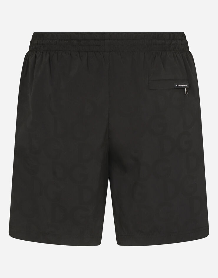 Mid-length swim trunks in hydro-sensitive fabric with logo print - 3