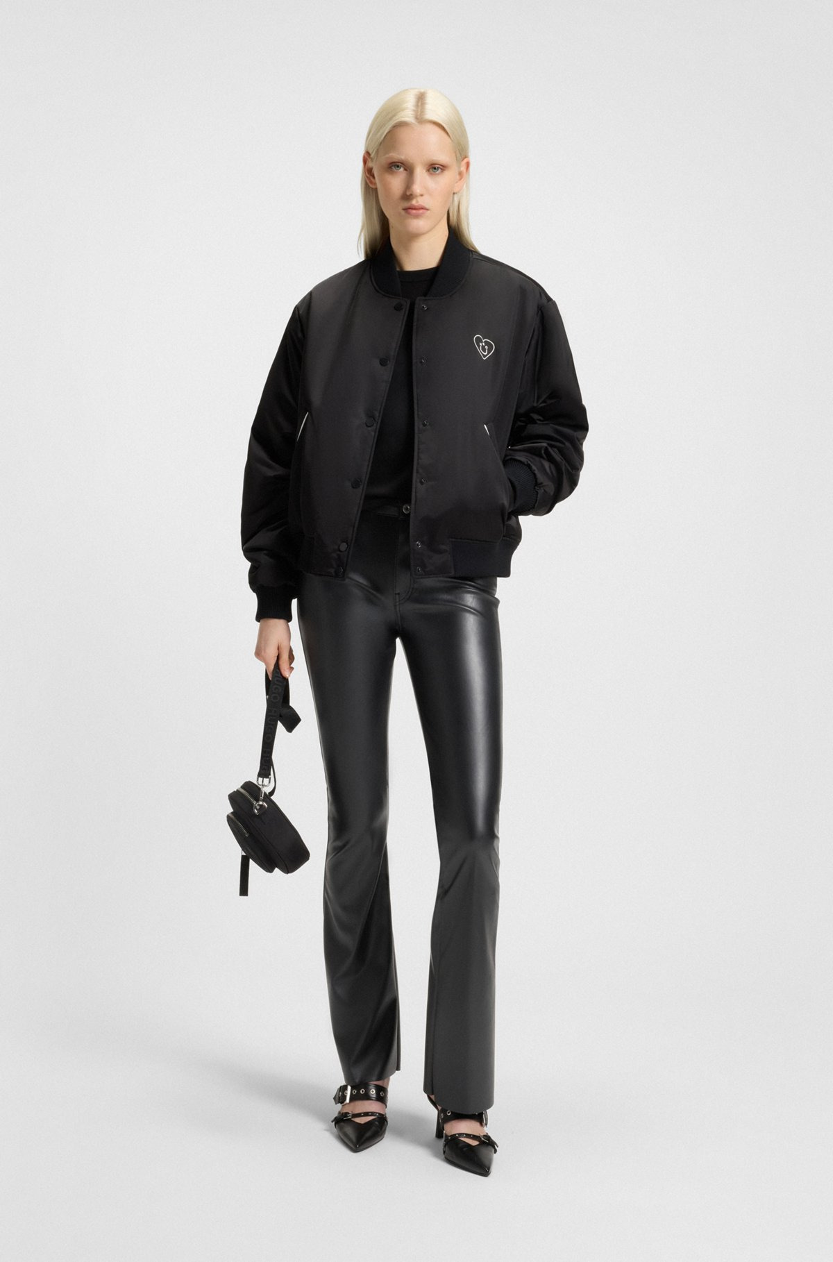 FAUX-LEATHER TROUSERS WITH FLARED LEG - 3