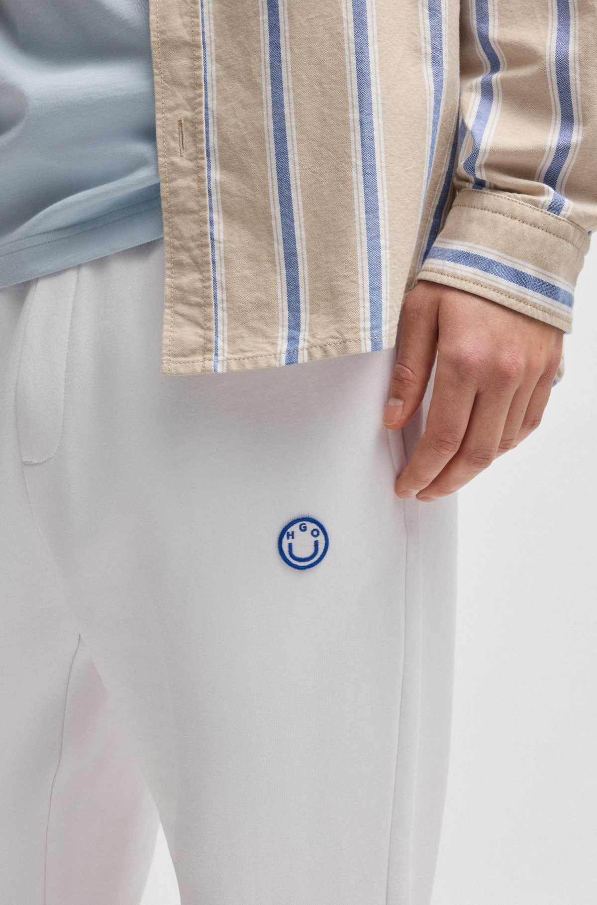 COTTON-TERRY TRACKSUIT BOTTOMS WITH HAPPY HUGO LOGO PATCH - 3