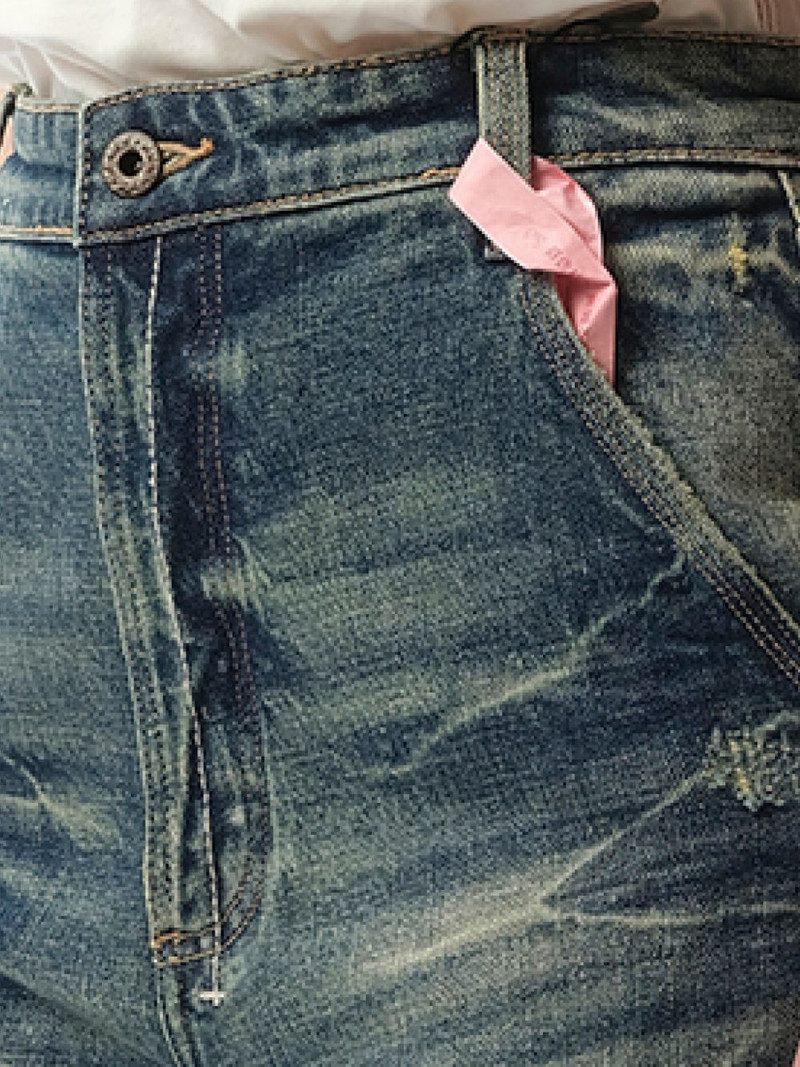 whiskering-effect jeans 6