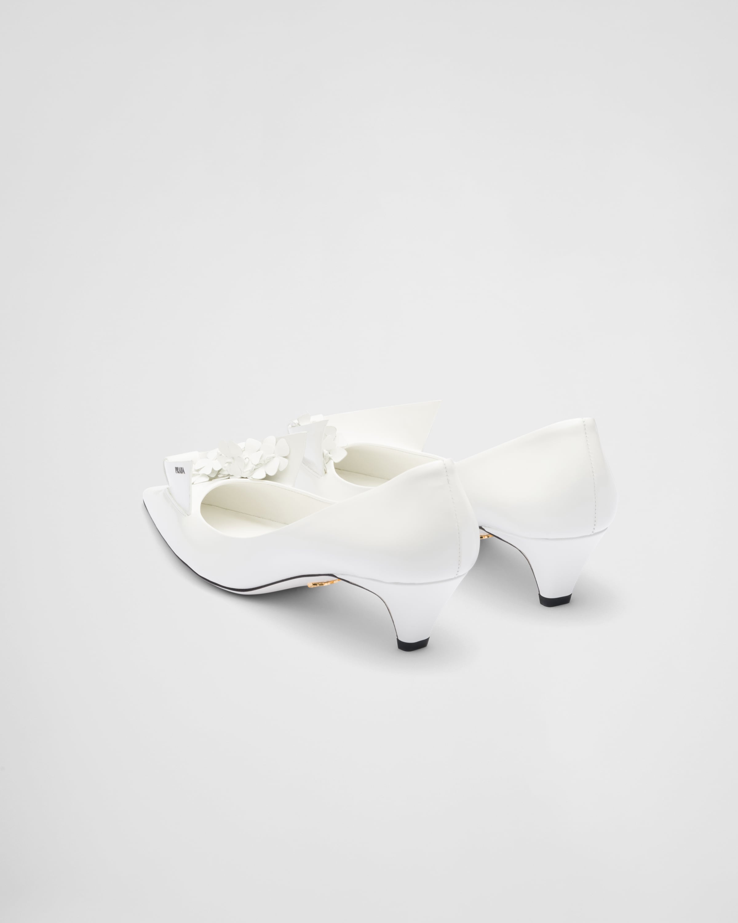 Brushed leather pumps with floral appliqués - 5