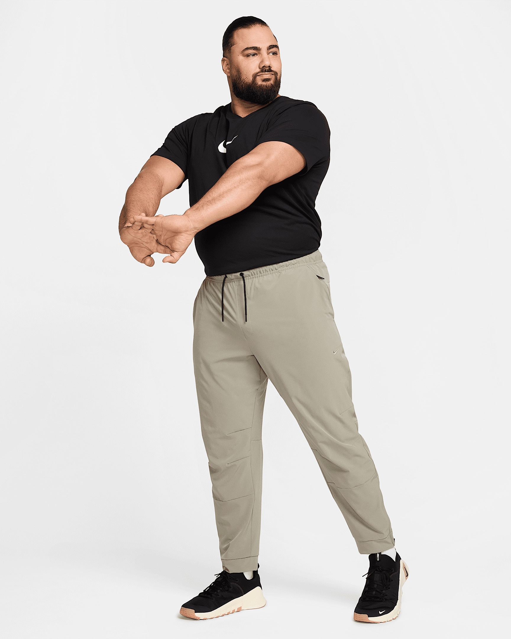 Nike Unlimited Men's Dri-FIT Zippered Cuff Versatile Pants - 13