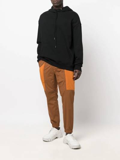 White Mountaineering colour-block tapered trousers outlook