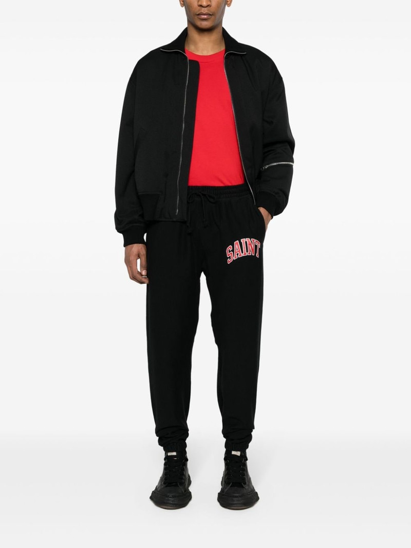 SAINT M×××××× logo-print track pants outlook