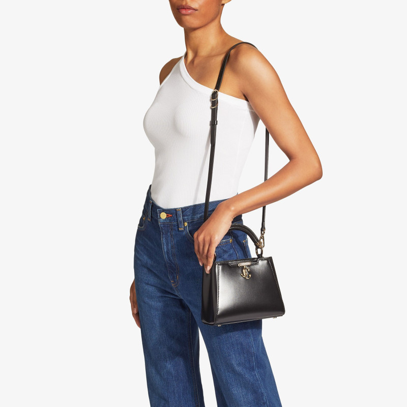 Varenne Top Handle Mini
Black Leather Top Handle Bag with Crystal Bar and JC Emblem 3