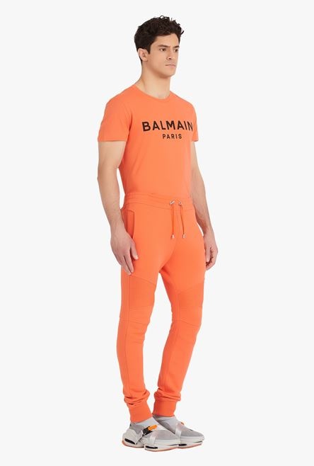 Orange cotton sweatpants with black Balmain Paris logo print - 7