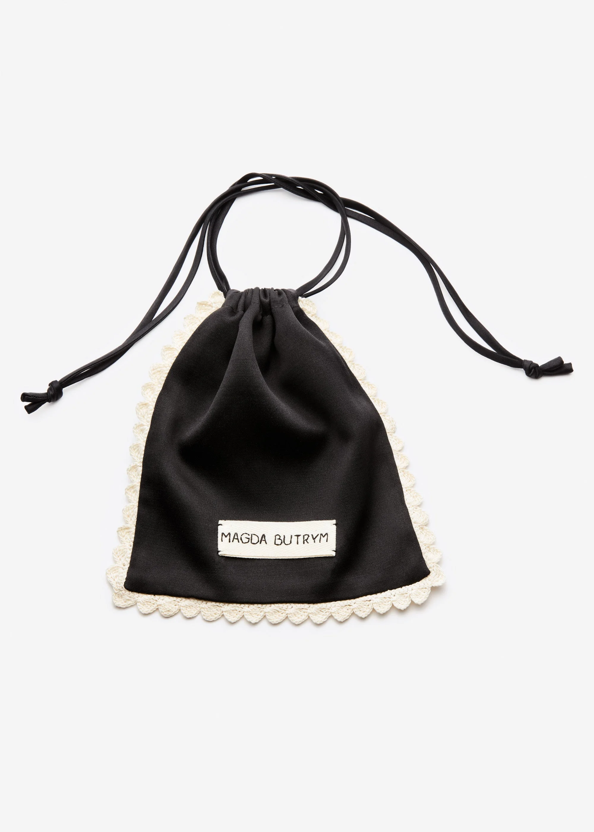 Silk pouch with crochet trim in black - 1