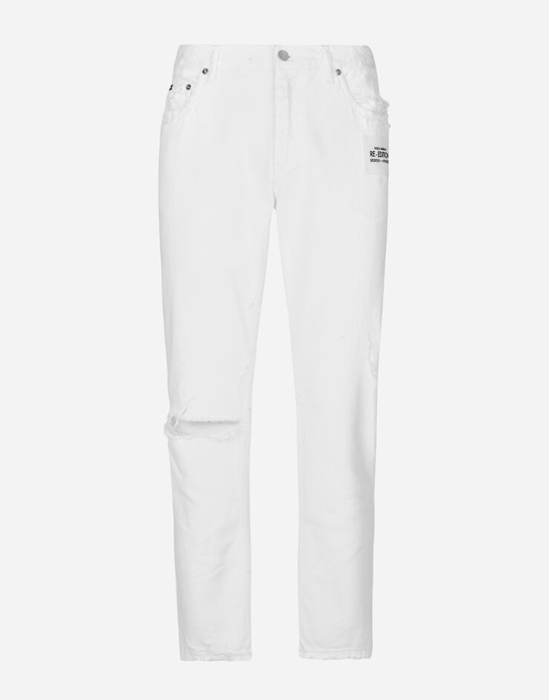 Loose white jeans with rips and abrasions 1