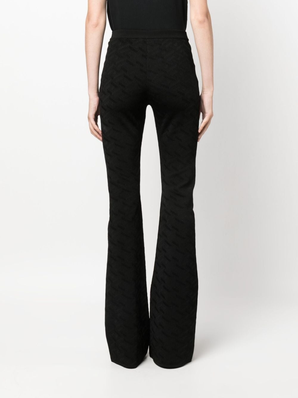 Greca-knit flared trousers - 4