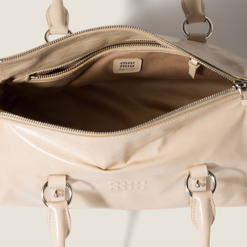 Shiny leather handbag 4