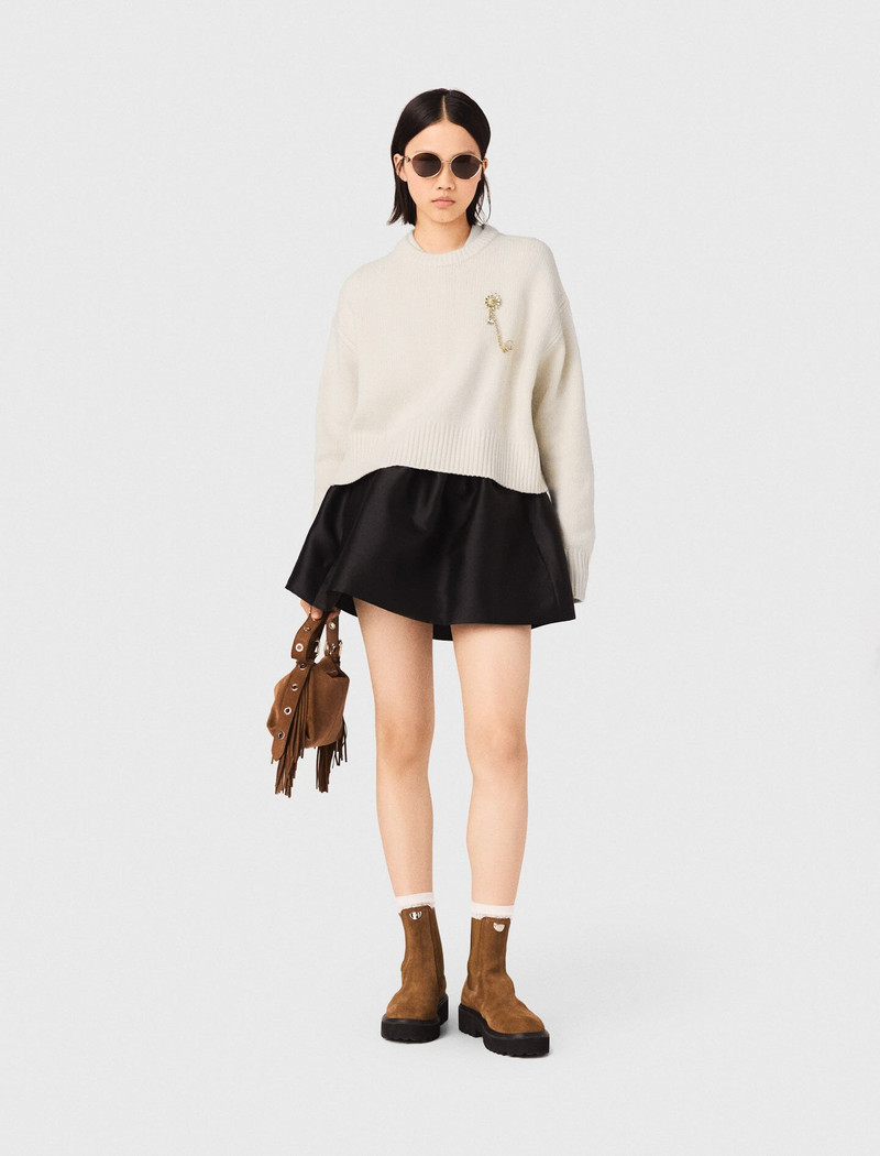 maje Jumper with floral brooch outlook