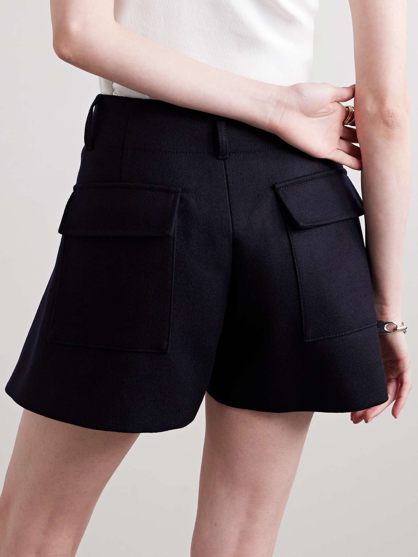 sacai Paneled denim and wool-felt shorts | netaporter