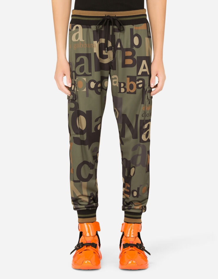 Jogging pants with all-over logo print - 1