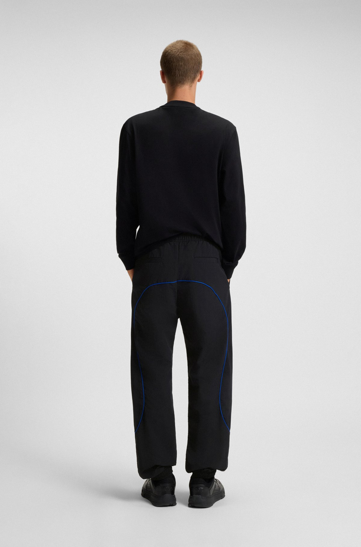 WATER-REPELLENT TROUSERS WITH LOGO AND PIPING - 2