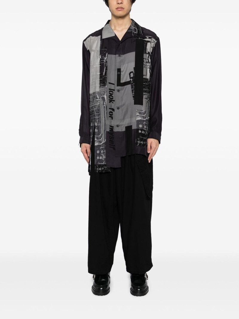 Yohji Yamamoto message-print switching-hem shirt outlook