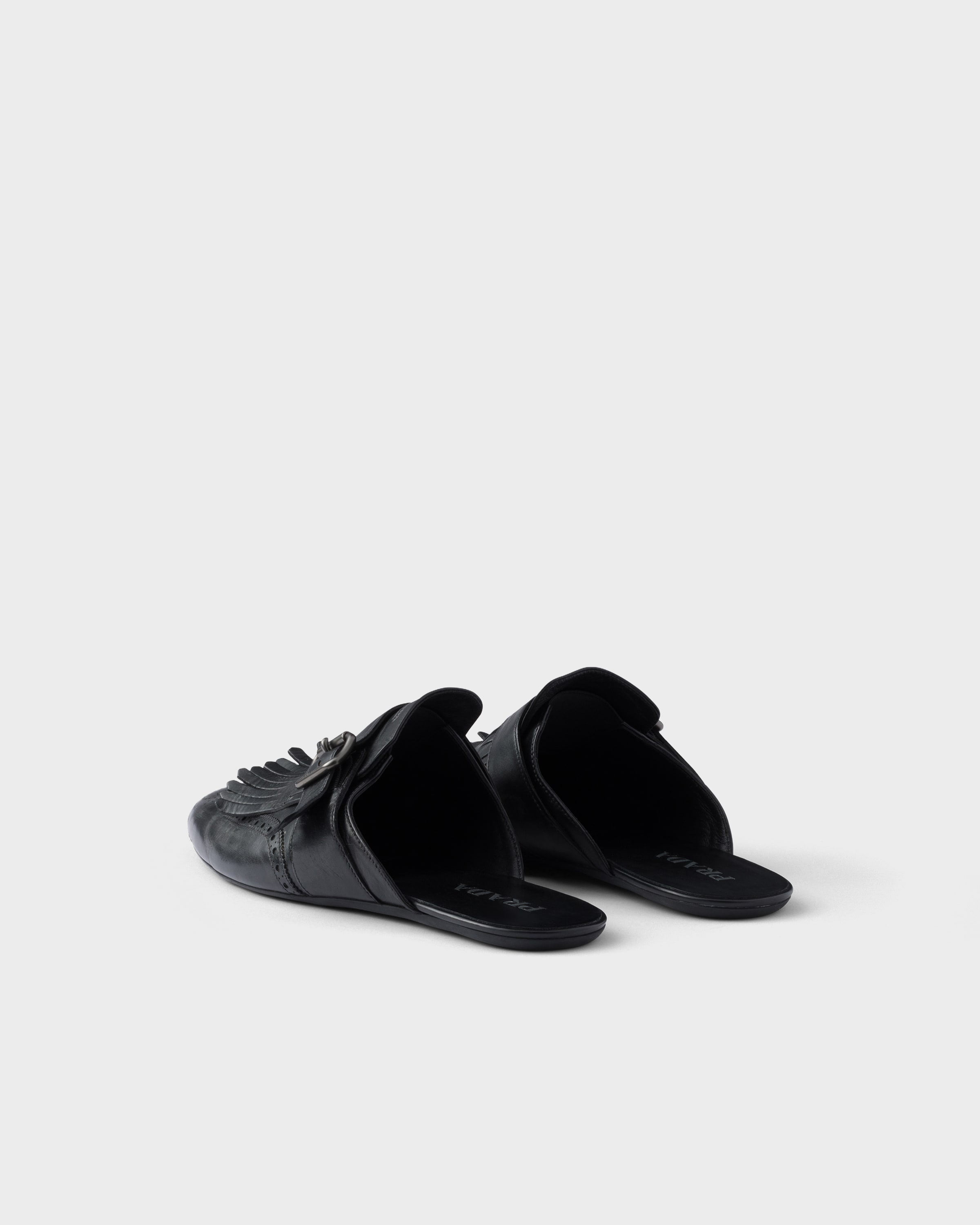 Shuffle antiqued leather mules with buckled strap and fringe - 5