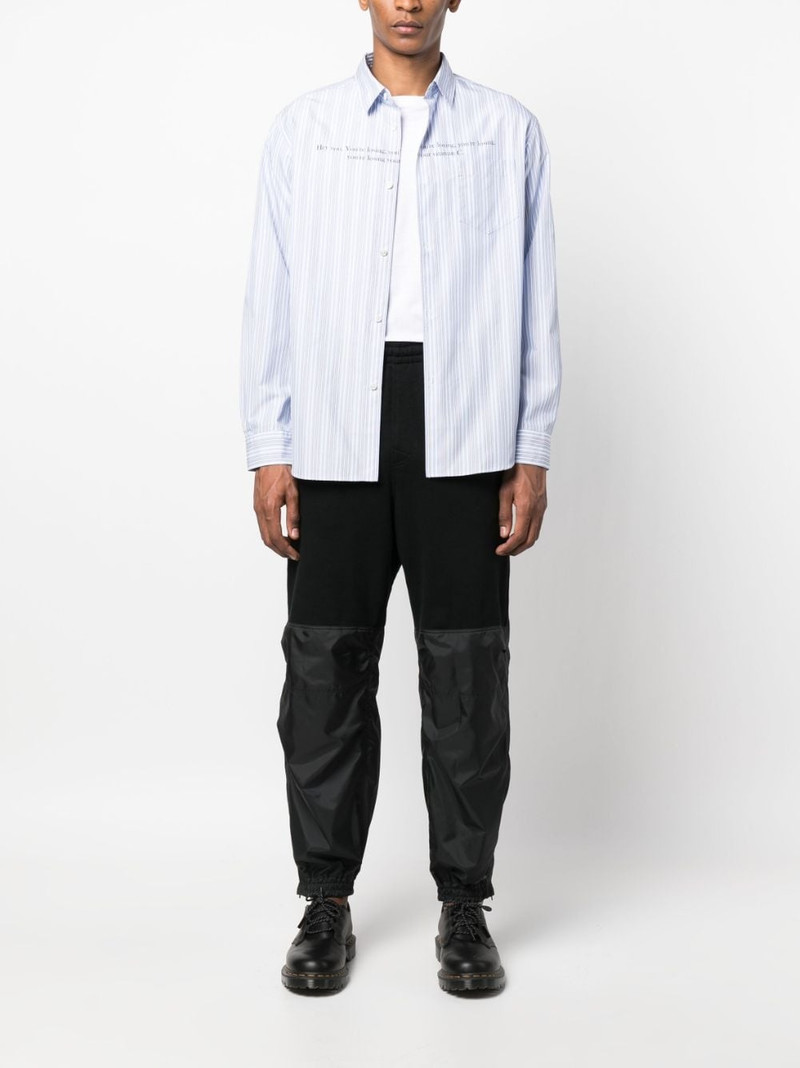 UNDERCOVER elastic-waist panelled track pants outlook