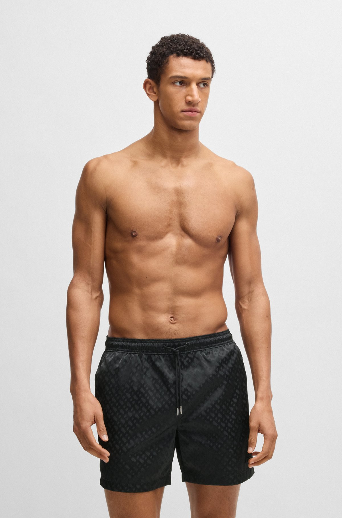 SWIM SHORTS WITH ALL-OVER TONAL MONOGRAMS - 2