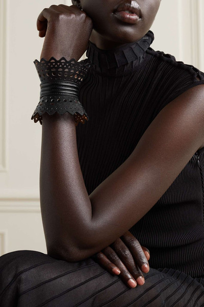 Alaïa Buckled laser-cut leather cuff outlook