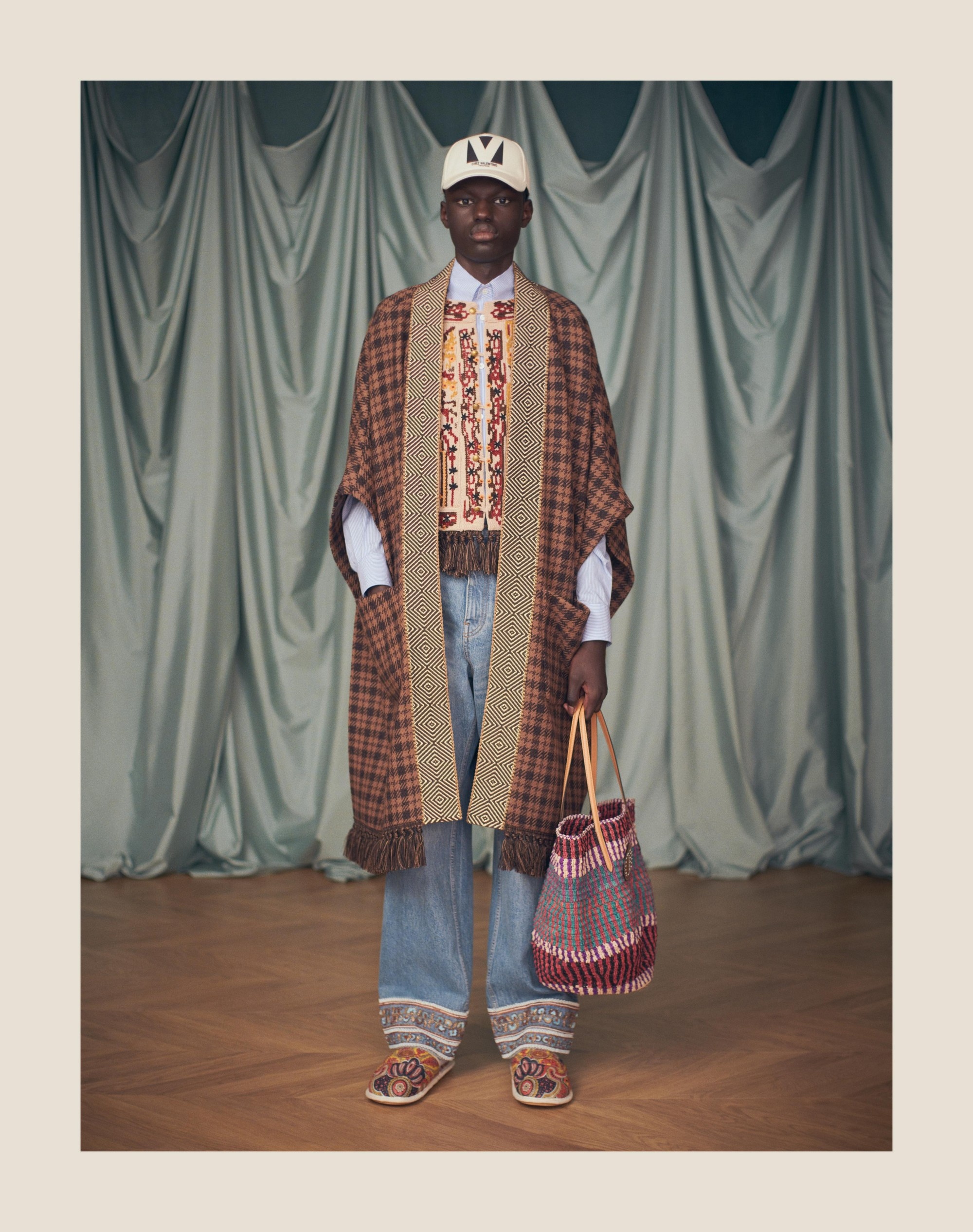 WOOL CAPE WITH JACQUARD TRIM AND TASSELS ON THE HEM - 10