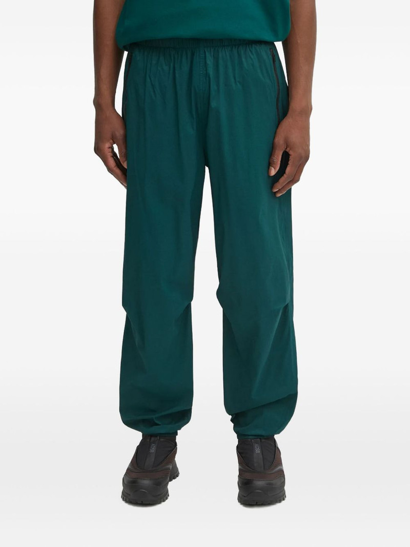 zip-pocket elasticated trousers 1