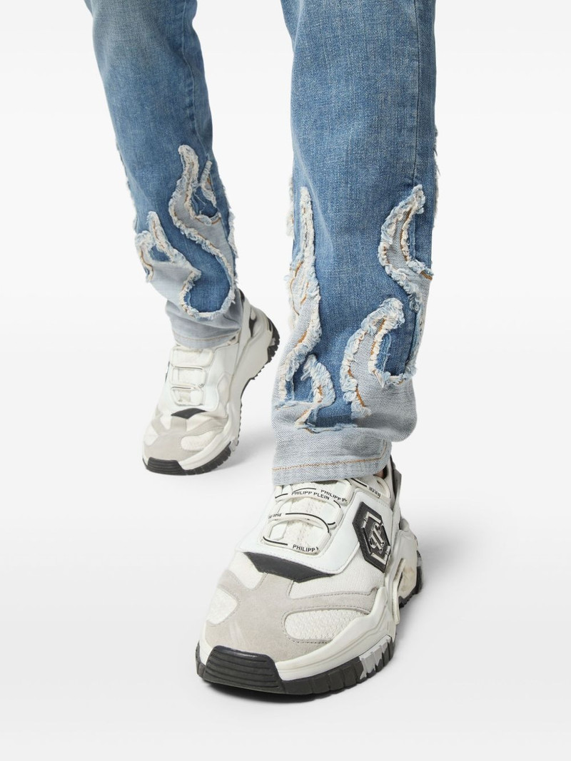 flame-appliqué jeans 5