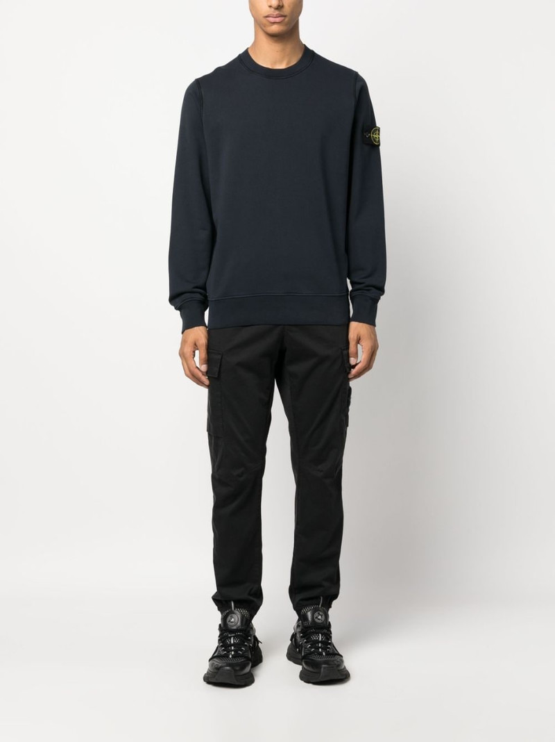 Stone Island logo-patch tapered-leg trousers outlook