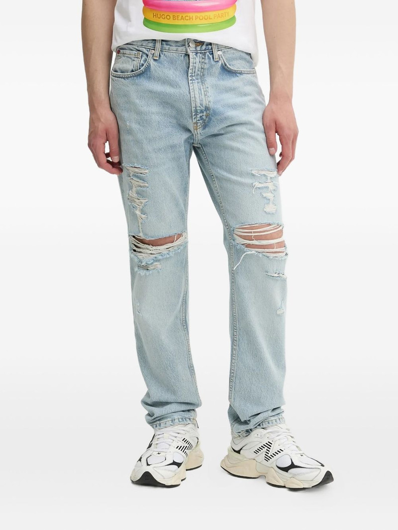 distressed five-pocket jeans 1