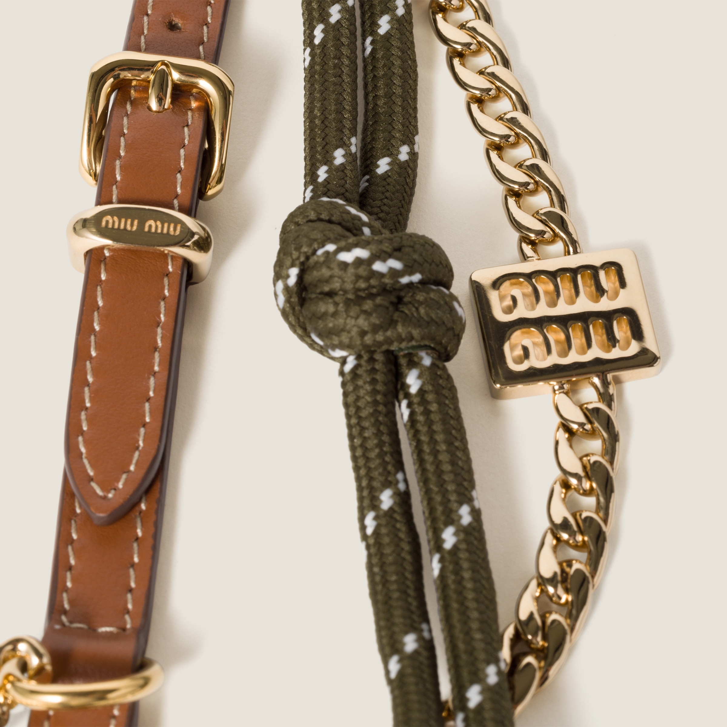 Miu Miu Leather, cord and metal trick | REVERSIBLE