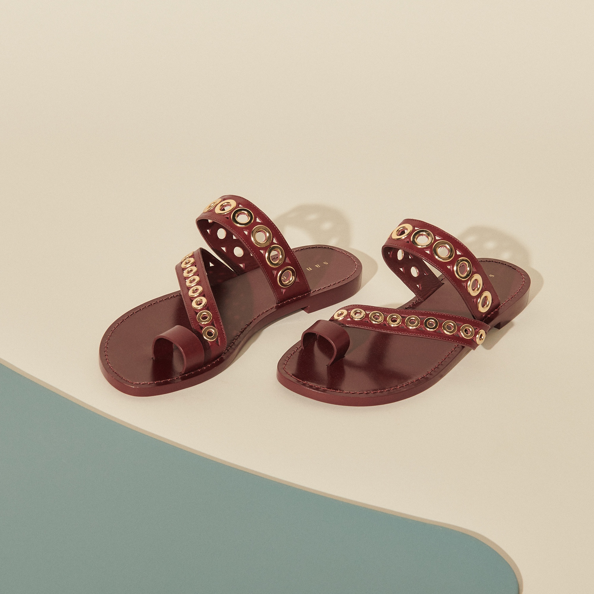 Leather sandals with eyelets - 1