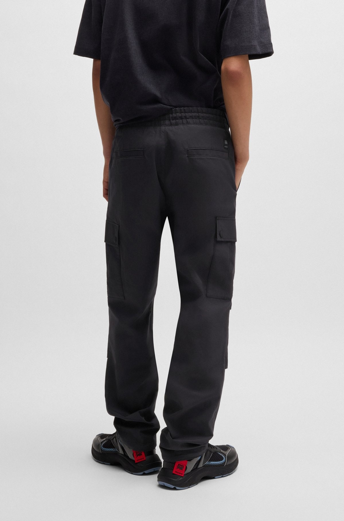 HUGO HUGO X RB REGULAR-FIT TROUSERS WITH CARBON STEALTH LOGO | REVERSIBLE