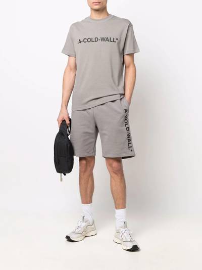 A-COLD-WALL* logo-print track shorts outlook