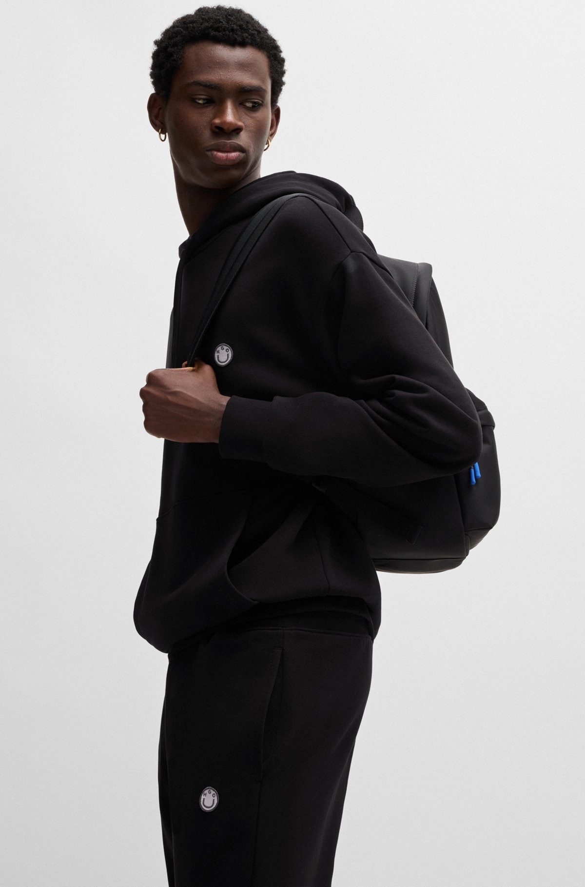 COTTON-TERRY TRACKSUIT BOTTOMS WITH HAPPY HUGO LOGO PATCH - 3