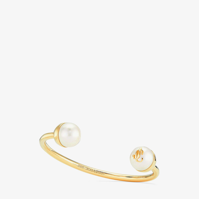 JC Pearl Cuff
Gold-Finish Metal Cuff Bracelet with Pearls 5