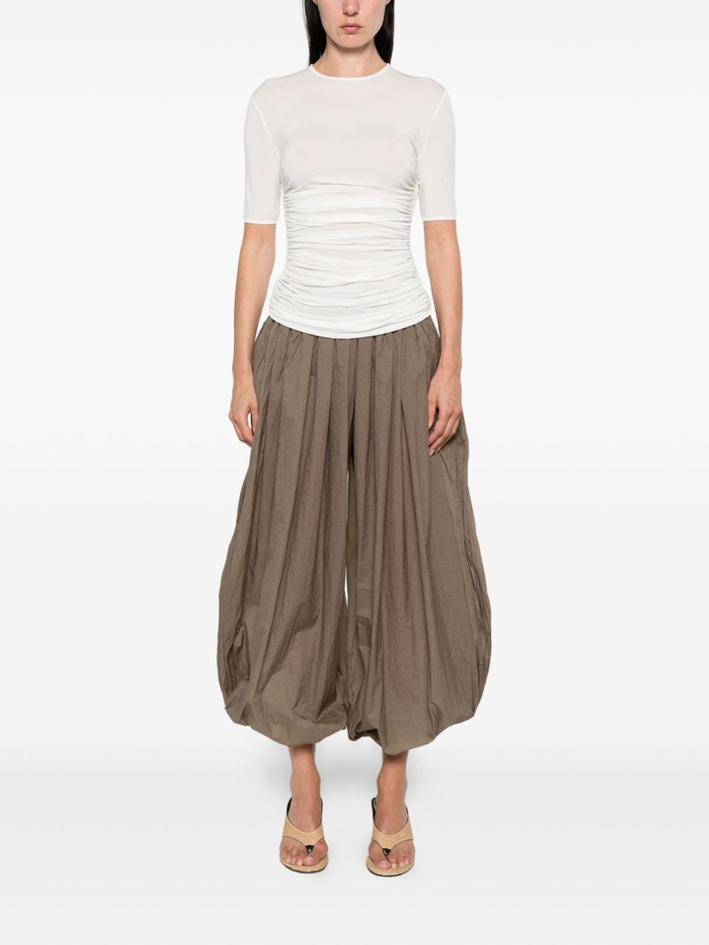 Alaïa pleat-detail balloon trousers outlook