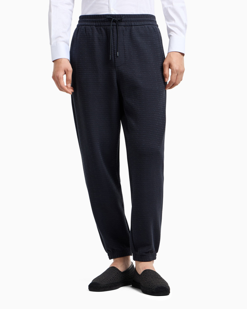 EMPORIO ARMANI ASV LYOCELL BLEND JERSEY JOGGERS WITH ALL-OVER LETTERING outlook